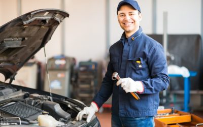 Auto mechanic working on car at Family Auto Service